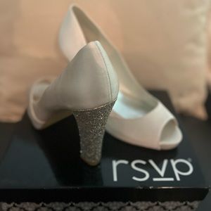 Beige gorgeous shoes with bling on the heels